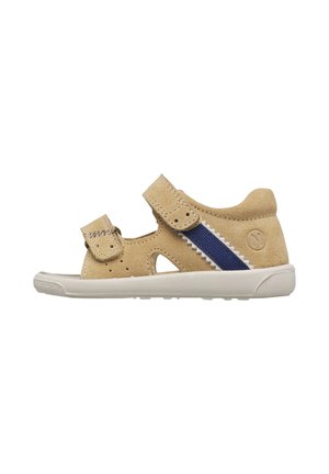 Sandalo beige in suede per bambini con due cinturini regolabili in Velcro e dettaglio elastico laterale blu su suola bianca.