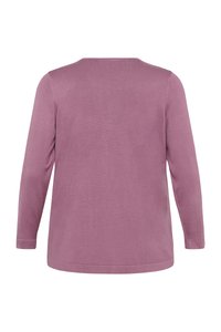 Ilga rankovė palaidinė šviesiai purple spalvos, pagaminta iš minkštos medžiagos. Sukurta su apvalia iškirpte ir laisvu, tiesiu kirpimu be papuošimų.