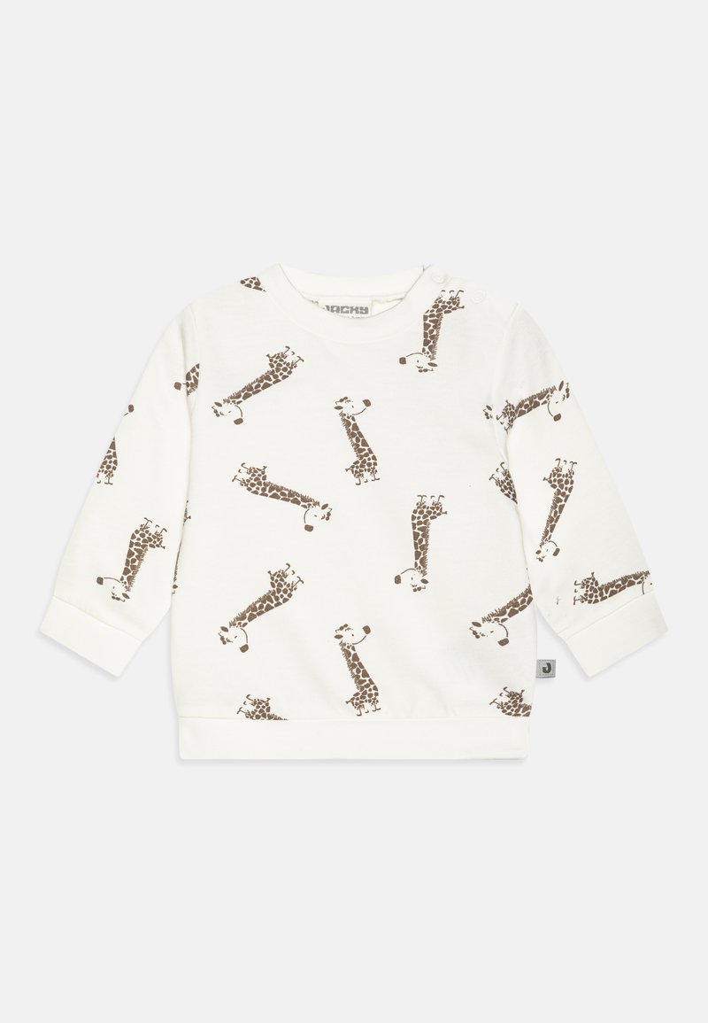 Balta garā piedurkņu sporta krekls ar atkārtotu brūnu žirafes rakstu. Mīksta auduma, riboti aproces un apkakle ar snap pogu detaļu.