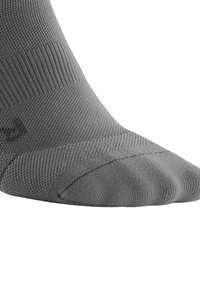 Socks grigi di materiale a maglia testurizzata, con punta e tallone rinforzati, una parte superiore liscia e un sottile design a coste.