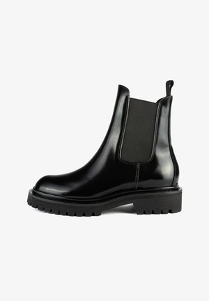 Botte Chelsea en cuir noir avec une finition brillante, panneaux élastiques et une semelle robuste. Caractéristiques : bout arrondi et languette pour un enfilage facile.