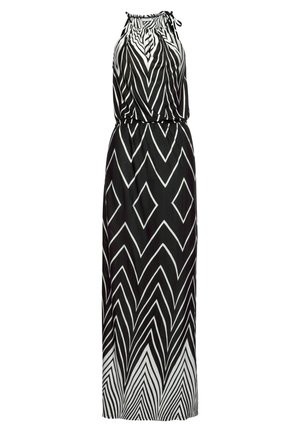 Zwart-witte mouwloze maxi-jurk met een halternek, elastische taille en geometrische zigzag- en diamantpatronen.