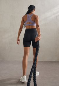 Puma SHAPELUXE  - Sujetadores deportivos con sujeción alta - pale plum