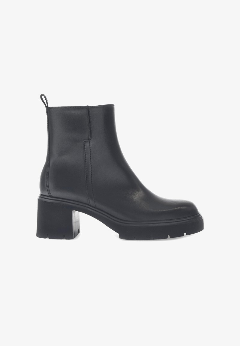 Bottine en cuir noir avec un bout arrondi, un talon carré, des détails de couture sur les côtés et une languette à l'arrière pour un enfilage facile.