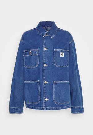 Blue denim jacket featuring a classic collar, two front pockets, silver hardware, and a small brand logo patch on the left chest.