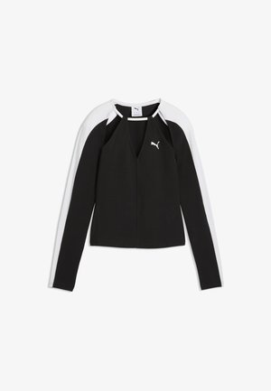 Czarny top Puma z długim rękawem, białymi ramionami i rękawami, z małym białym logo Puma na piersi i dekoltem w kształcie litery V.