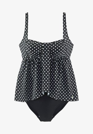 Schwarzer Badeanzug mit Punkten, einem ausgestellten Oberteil, verstellbaren Trägern und einem einfarbig schwarzen Unterteil. Mit einer Krawatte in der Mitte.