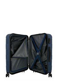 Valigia rigida blu marina con finitura strutturata, doppi scomparti, rivestimento interno grigio, tasca con zip e cinghie regolabili per fissare il contenuto.