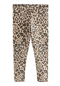Beige leggings fekete és barna leopárdmintával, rugalmas derékkal és sima, rugalmas szövet textúrával.