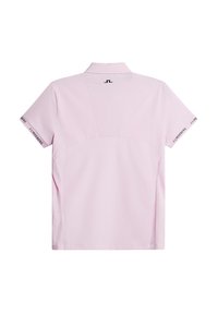 Kortärmad polo i ljusrosa, med en texturerad bakpanel, subtil varumärkeslogga på ärmarna och en klassisk kragsdesign.