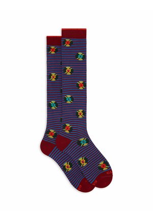 Knee-high socks with a red ribbed cuff, blue and purple stripes, and circular floral patterns in green, yellow, and red throughout.