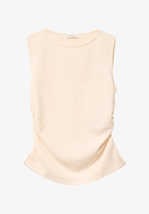 Haut beige sans manches avec col rond, côtés froncés, coupe ajustée, et étiquette "Cache Cache" au col intérieur.