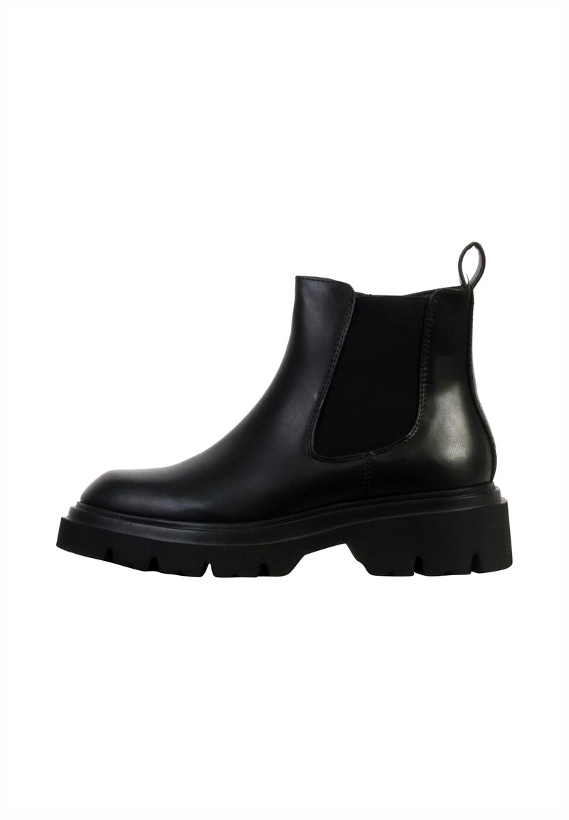 Bottes cheville en cuir noir avec panneaux latéraux élastiques, une languette à tirage, et une semelle en caoutchouc épaisse avec des rainures profondes pour une meilleure adhérence.