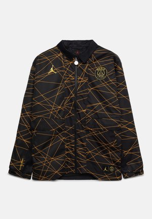 Schwarze Jacke mit gelben geometrischen Linien, Reißverschluss, zwei Fronttaschen und Logos auf der Brust. Hergestellt aus glattem, leichtem Material.