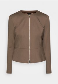 Veste moulante marron à manches longues, avec une fermeture éclair argentée à l'avant, dotée d'un col rond et d'un ourlet légèrement évasé.