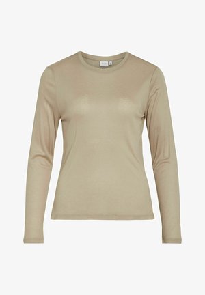 Beige langermet t-skjorte laget av mykt stoff med rund hals og minimalistisk design, med fine sømmer langs kantene.