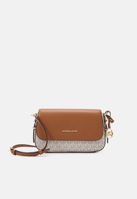Brown and beige Michael Kors crossbody bag with MK monogram print, gold logo charm, and adjustable leather strap on white background.