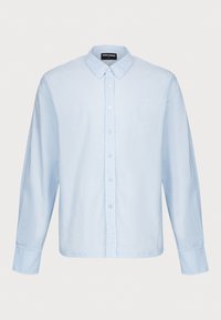 Modrá pruhovaná košeľa s dlhým rukávom a zapínaním na gombíky, vo voľnejšom strihu a s jemným logom na ľavej strane hrude. Mäkký bavlnený materiál.