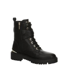 Botte de combat noire en cuir à lacets avec fermeture éclair latérale, semelle épaisse en caoutchouc et détails métalliques dorés au talon et sur la tirette.