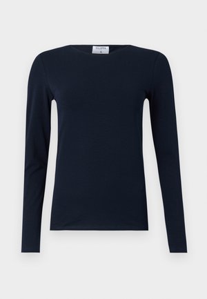 Mornarska dolga majica z dolgimi rokavi, izdelana iz mehkega bombaža. Ima okroglo ovratnico, slim fit kroj in običajen rob brez vidnih vzorcev ali dodatkov.
