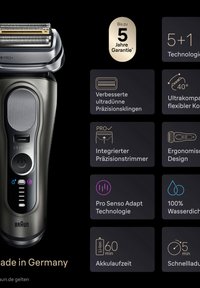 Elektrischer Rasierer mit schwarzem ergonomischem Gehäuse, Präzisionsklingen, integriertem Trimmer und LED-Display zur Anzeige von Batteriestatus und Wasserbeständigkeit.