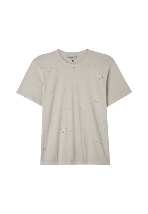 T-shirt in cotone grigio chiaro con una vestibilità rilassata, caratterizzato da numerosi piccoli fori sfilacciati su tutta la superficie e un design a girocollo.