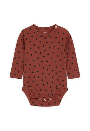 Body bébé à manches longues couleur rouille avec pois noirs, boutons-pression à l'épaule et à l'entrejambe pour un habillage facile.