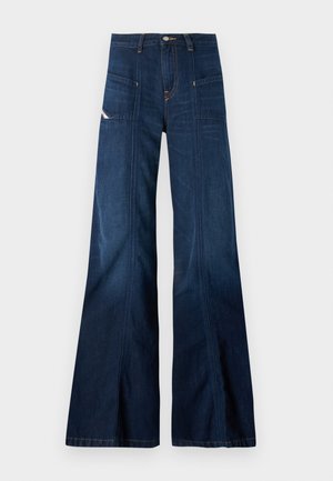 Tumši zili plati džinsi ar augstu jostasvietu, lielām priekšējām kabatām un kontrastējošiem šuvumiem. Iekļauj pogu aizdari un teksturētu denima audumu.