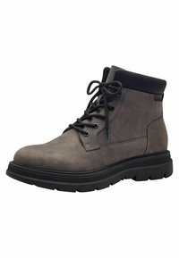 Bottes chelsea en cuir gris avec bord noir, bout rond et semelle en caoutchouc texturé. Comprend un devant à lacets et des accents latéraux pour plus de durabilité.