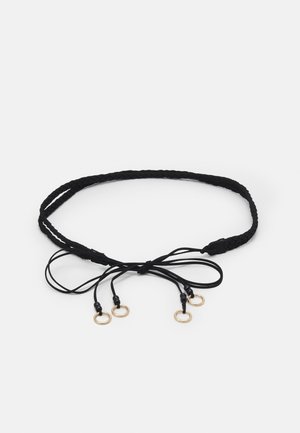 Black braided belt with adjustable thin cords ending in small gold rings on a white background.