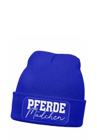 Blue knitted beanie with a cuff, featuring a rectangular patch with the text "PFERDE Mädchen" in white, contrasting font styles.
