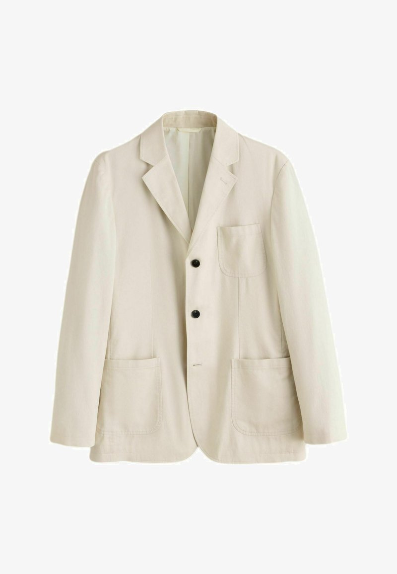 Blazer beige à simple boutonnage avec revers à encoche, deux boutons noirs, trois poches plaquées, et manches longues, présenté sur fond blanc.