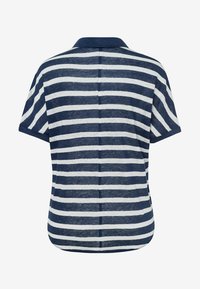 Chemise à manches courtes bleu marine et blanche à rayures horizontales, vue de dos.