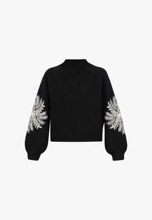Juodas megztinis su aukštu kaklu ir pūstomis rankovėmis. Su baltomis gėlėmis siuvinėjimais ant abiejų rankovių. Patogus tekstūra, trumpintas dizainas.
