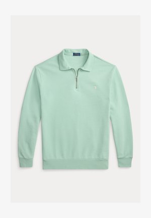 Jersey de manga larga de color verde claro con cremallera hasta un cuarto, con cuello y pequeño logo bordado en el pecho izquierdo de Polo Ralph Lauren.
