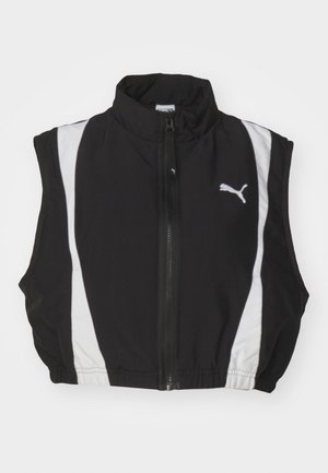 Gilet senza maniche nero con colletto alto, caratterizzato da strisce laterali bianche e una cerniera frontale; il tessuto sembra liscio e leggero con un logo.