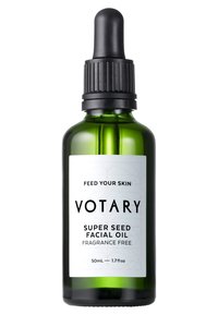 Ciemnozielona szklana buteleczka z kroplomierzem i czarną zakrętką. Biała etykieta z czarnym tekstem głosi "OLEJ DO TWARZY VOTARY SUPER SEED", 50 ml. Bez zapachu.