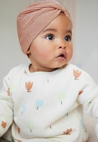 Next - TURBAN STANDARD - Pletena kapa - rust brown Miniaturna slika 1