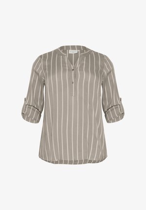Világos bézs blúz függőleges fehér csíkokkal, V nyakkivágással, háromnegyedes ujjal, felgöndörített részlettel és laza fazonnal. Puha, sima textúra.
