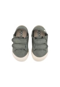 Zapatos de lona verdes con dos correas de velcro, suelas de goma beige, punta redondeada y un logo impreso en la plantilla.