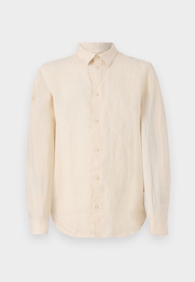 Langermet skjorte i lys beige lin, med knappelukking foran, klassisk krage og buet kant. Glatt tekstur med en sprø finish.
