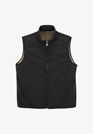 Zwart mouwloos vest met hoge hals, volledige ritssluiting, twee voorkruiszakken en een beige binnenvoering. Gladde stof met minimale details.