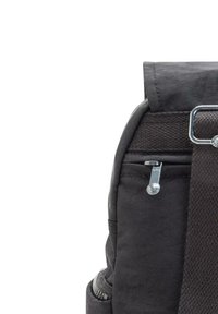 Black fabric backpack with a roll-top closure, silver hardware, texture accent, and a front zip pocket. Features a woven strap and side stitching.