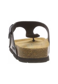 Infradito neri in gomma con una soletta in sughero. Presentano una cinghia posteriore e un inserto per le dita. Texture liscia con un design sagomato per il comfort.