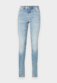 Jeans skinny de color azul claro deslavado con cintura alta, diseño de cinco bolsillos y un sutil desvanecimiento en los muslos. Incluye un cierre de botón.