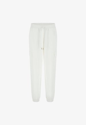 White jogger pants made of soft fabric with an elastic waistband, drawstring, and side cargo pockets. Cuffed ankles and minimal design details.