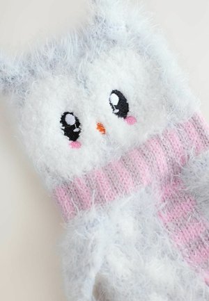 Owl-shaped plush gloves with soft white fur, grey accents, and a pink knitted cuff. Features embroidered eyes and an orange beak.