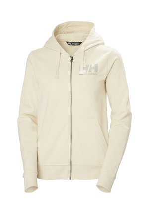 Sudadera con capucha beige con cremallera, bolsillo tipo canguro frontal, capucha con cordón y un logo gris sutil en el pecho izquierdo.