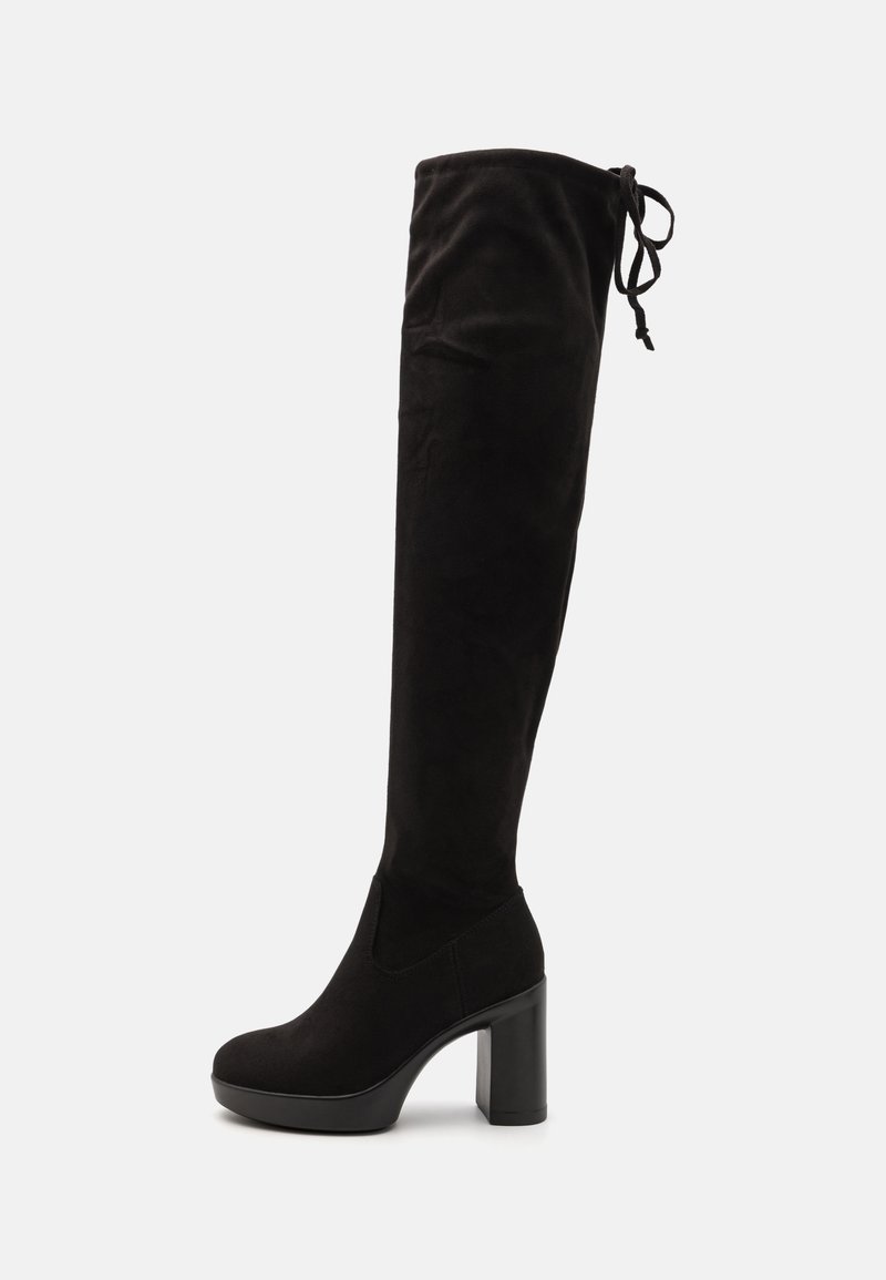 Black over-the-knee boots made of soft material, featuring a rounded toe, thick block heel, and adjustable tie at the top.