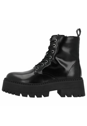 Black patent leather ankle boots with a chunky black rubber sole, featuring round toe, lace-up design, and a pull tab at the back.